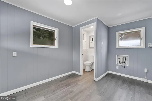 an empty room with windows