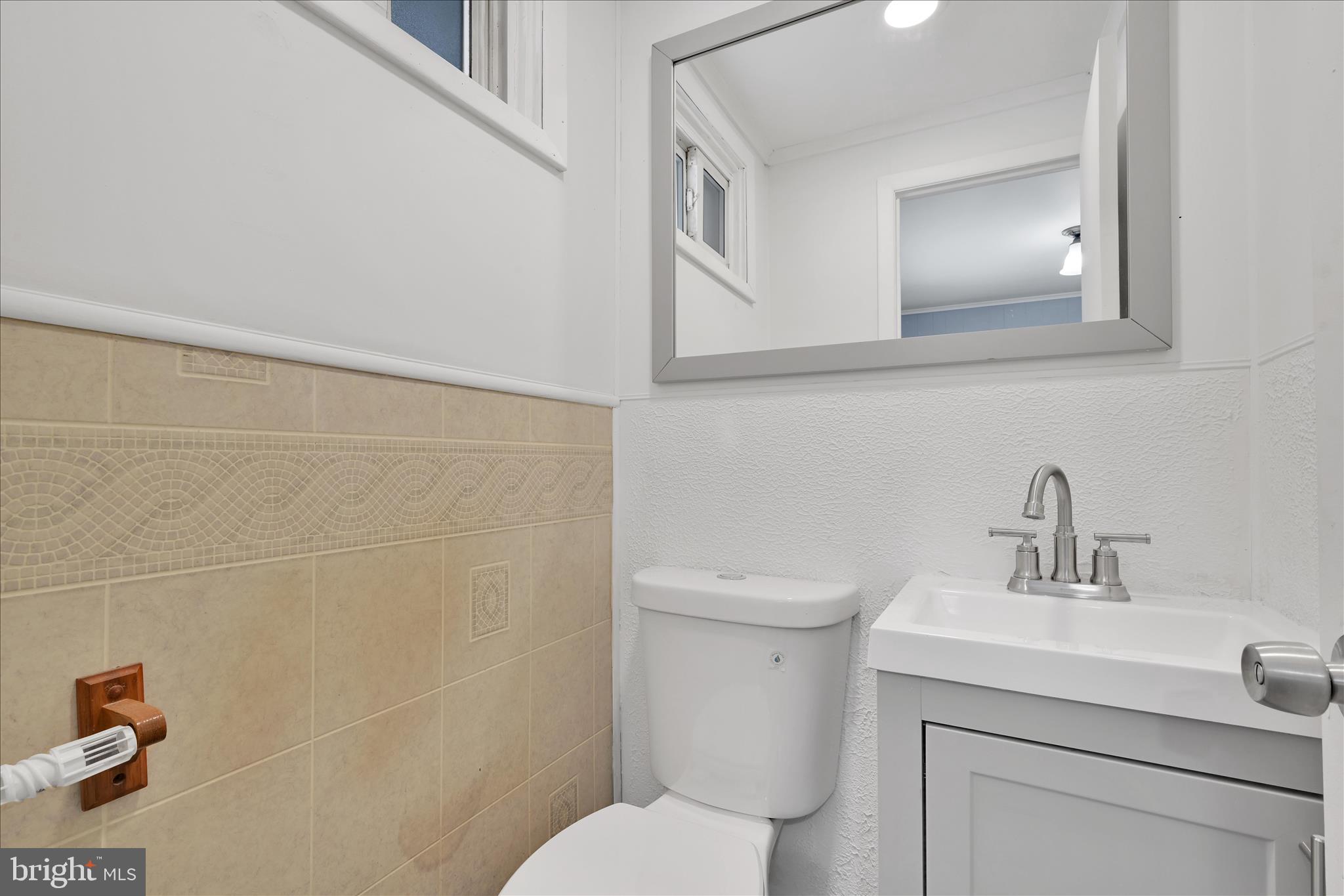 2 Edgar Lewis Street Minersville, PA 17954 - Photo 19 of 29 a bathroom with a toilet sink and mirror