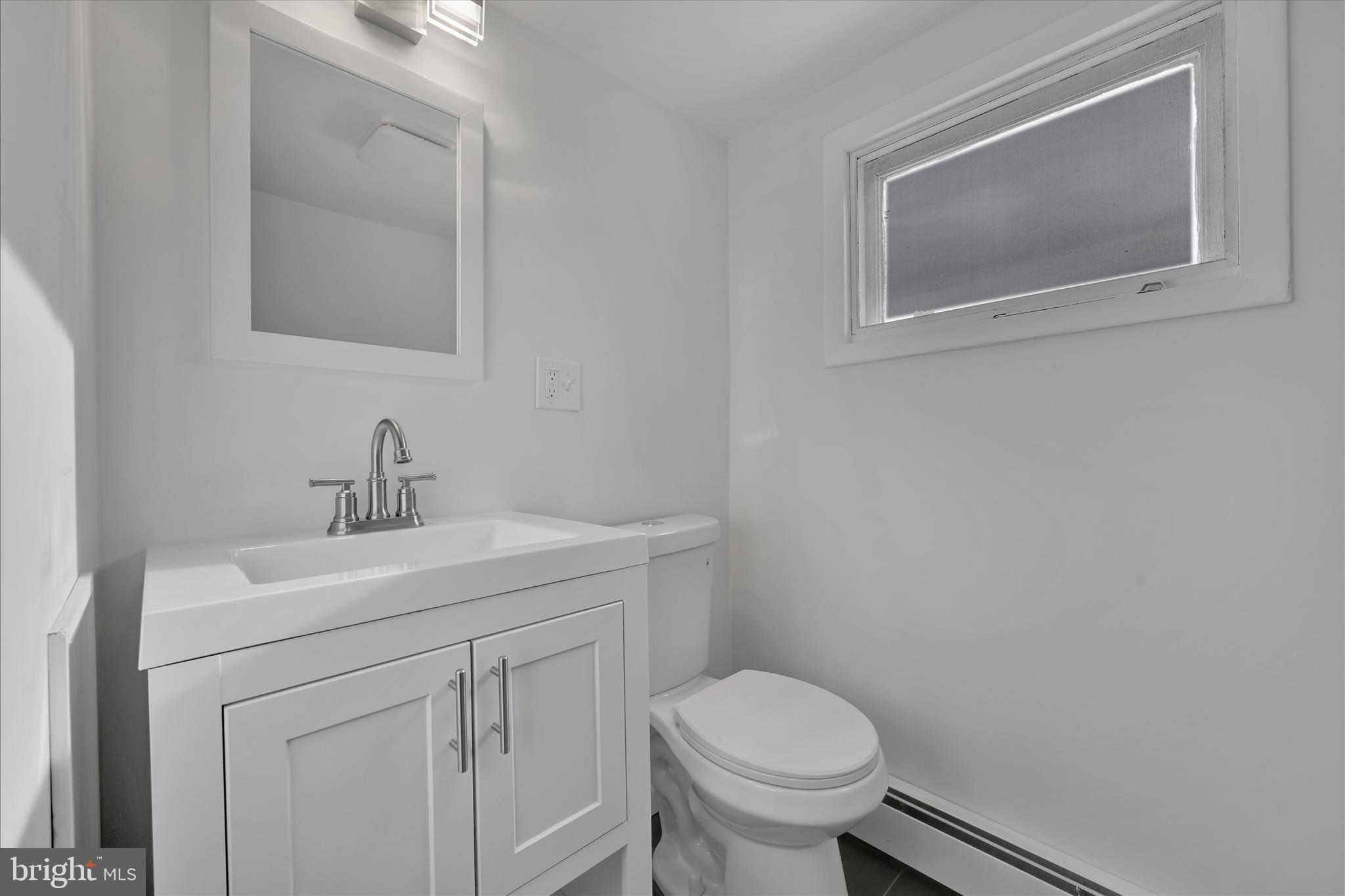 2 Edgar Lewis Street Minersville, PA 17954 - Photo 25 of 29 a bathroom with a toilet sink and mirror
