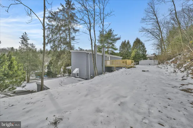 a view of a backyard of the house