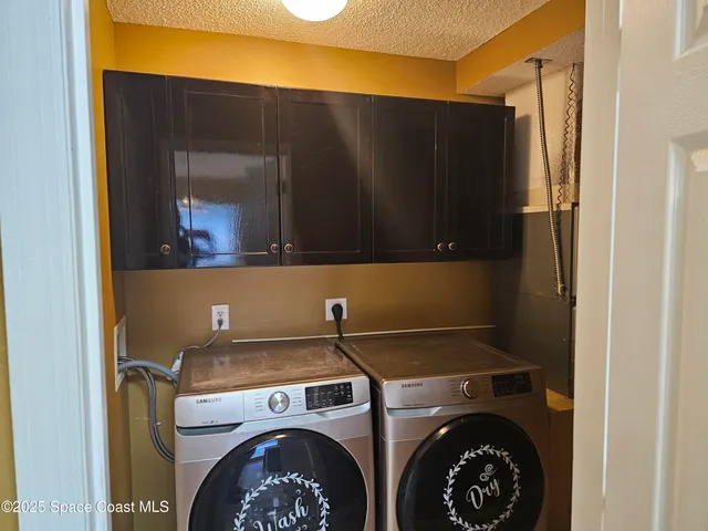 a view of a glass door and a window