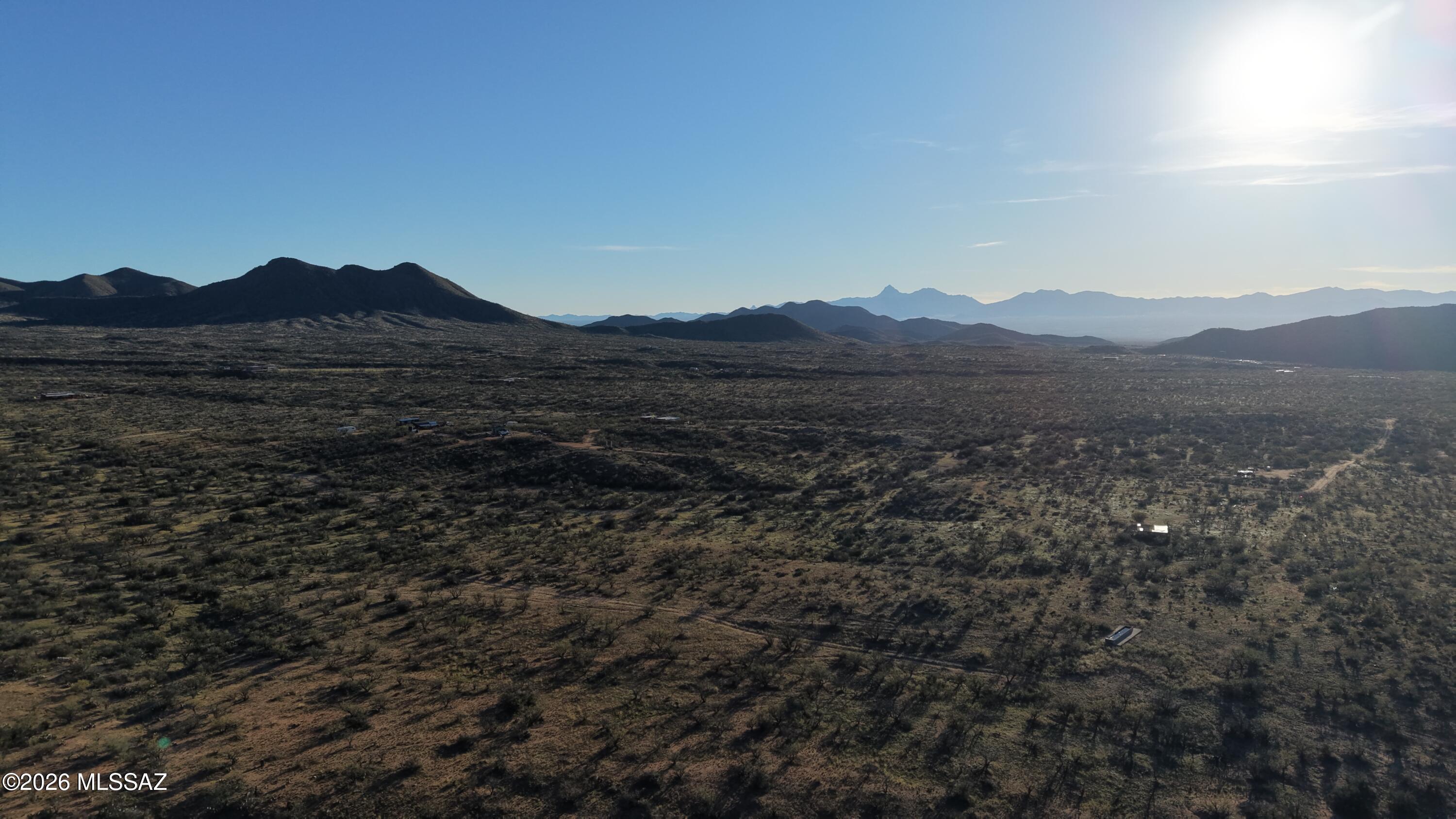 17027 South Sierrita Mountain Road Tucson, AZ 85736 - Photo 23 of 34 a view of a town with mountains in the background