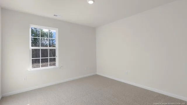 an empty room with a window