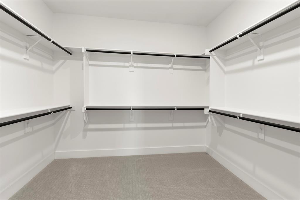 13709 Riola Drive Little Elm, TX 75068 - Photo 33 of 40 a view of an empty walk in closet