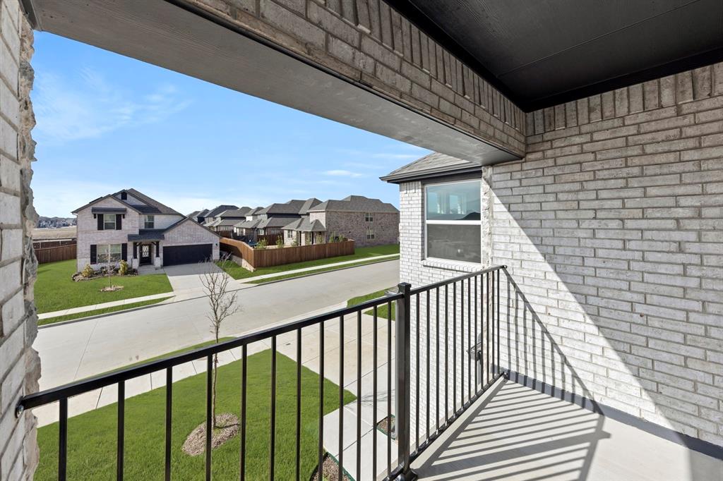 13709 Riola Drive Little Elm, TX 75068 - Photo 37 of 40 a view of a balcony with two chairs