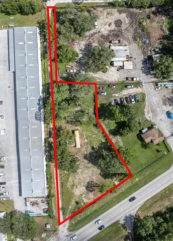 a view of a yard with trampoline