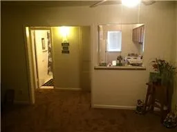 a view of a hallway with workspace