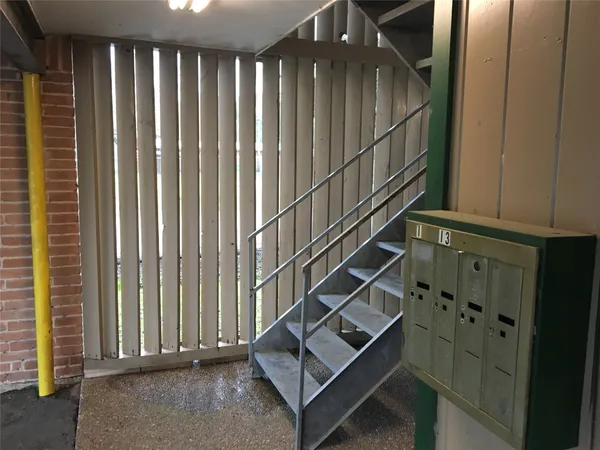 a view of entryway with stairs