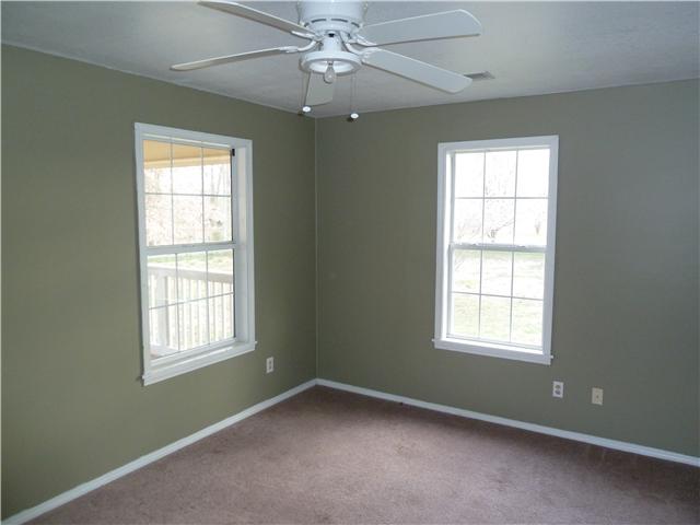 1820 Limestone Road Elora, TN 37328 - Photo 10 of 14 an empty room with a window and a fan