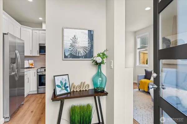 a view of living room with furniture and flat screen tv