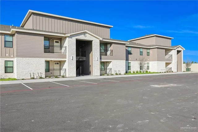 a view of a house with a street