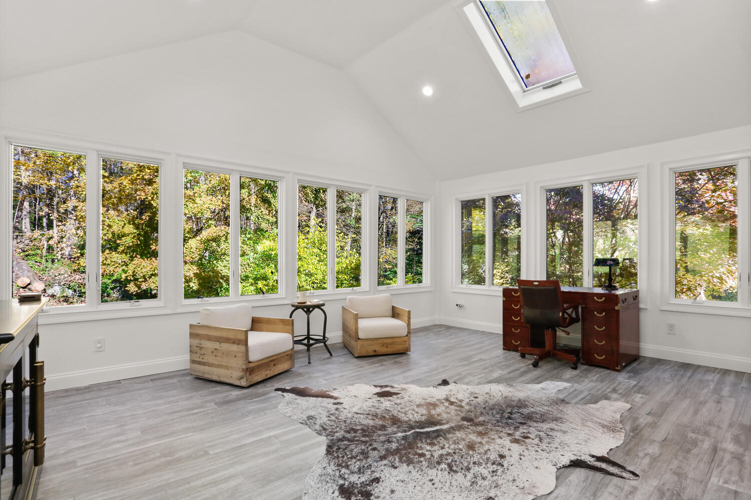 182 Deep Valley Road New Canaan, CT 06840 - Photo 13 of 34 a living room with furniture and windows