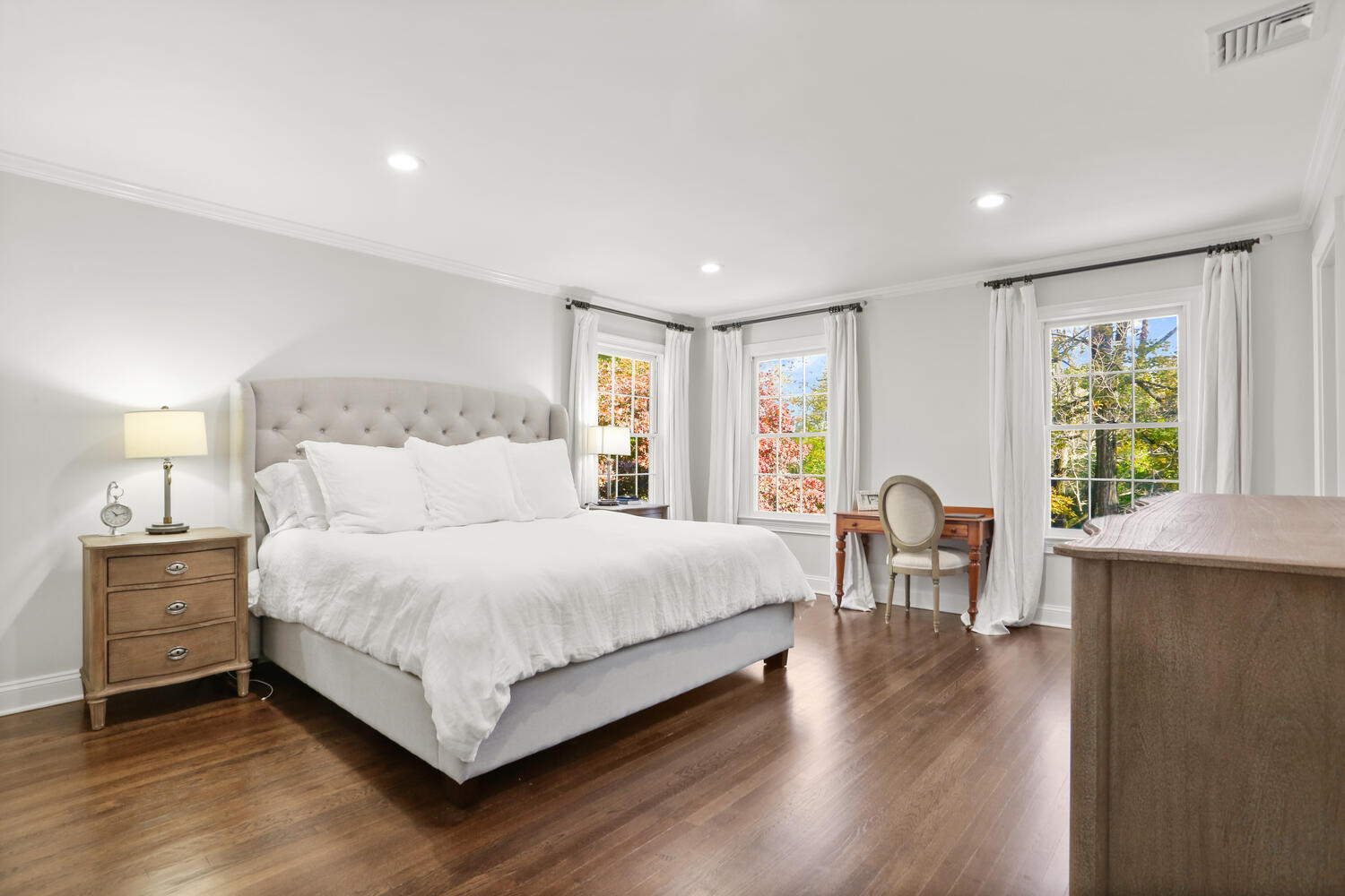 182 Deep Valley Road New Canaan, CT 06840 - Photo 15 of 34 a large bedroom with a bed and window