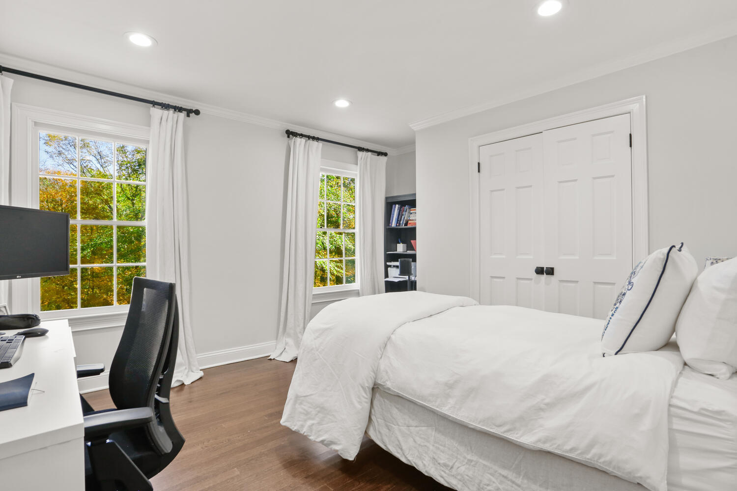 182 Deep Valley Road New Canaan, CT 06840 - Photo 18 of 34 a bedroom with a bed a computer on the desk and chair