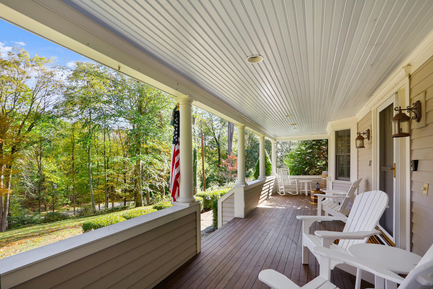 182 Deep Valley Road New Canaan, CT 06840 - Photo 3 of 34 a living room with large windows and furniture