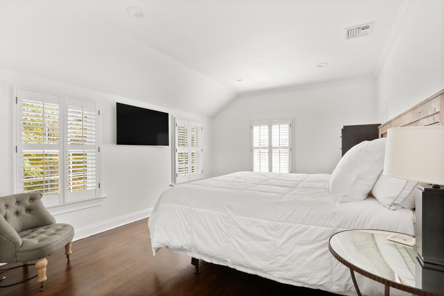 182 Deep Valley Road New Canaan, CT 06840 - Photo 21 of 34 a bedroom with a bed and a flat screen tv