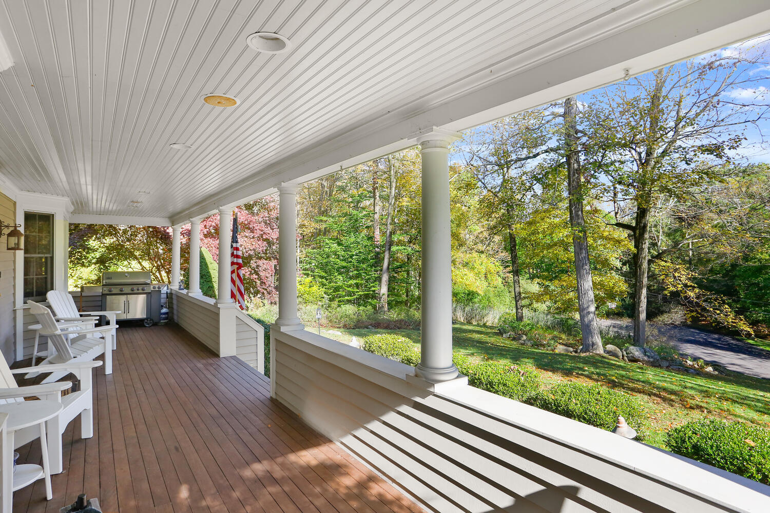 182 Deep Valley Road New Canaan, CT 06840 - Photo 31 of 34 a view of a porch with furniture and garden