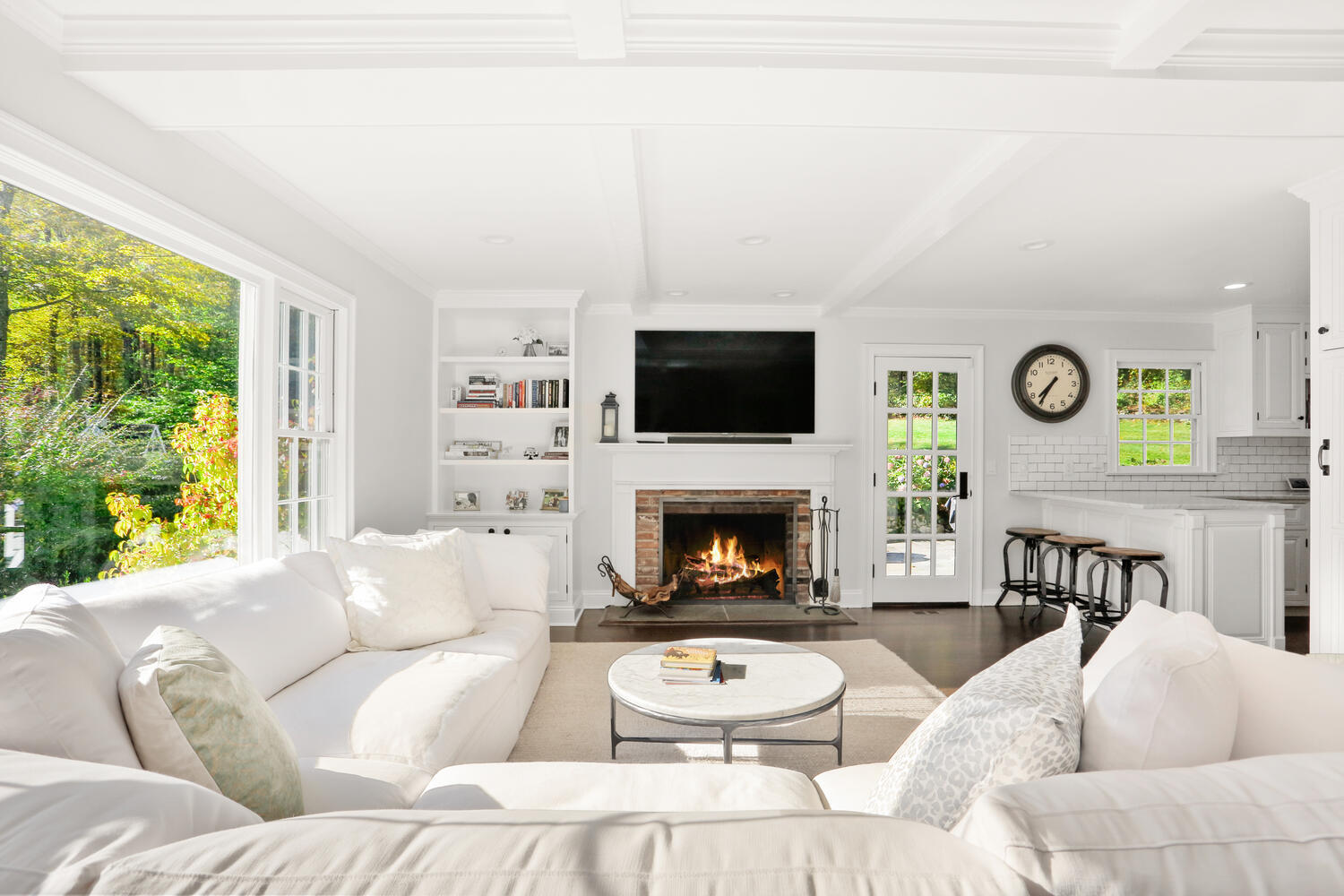 182 Deep Valley Road New Canaan, CT 06840 - Photo 5 of 34 a living room with furniture and a fireplace