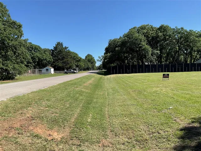 a view of an outdoor space and a yard