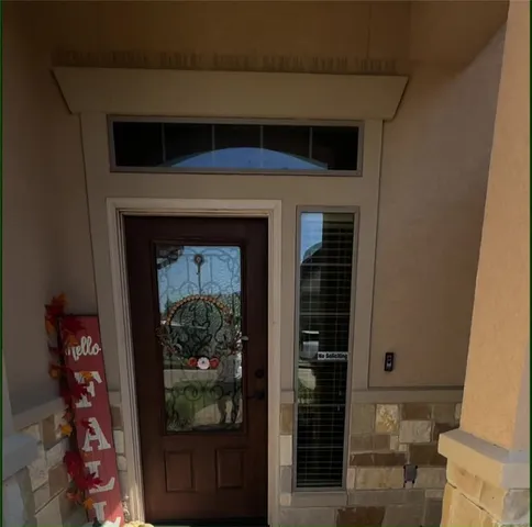 a living room with a fireplace