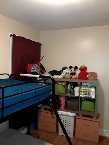 a room with a mirror and a sink