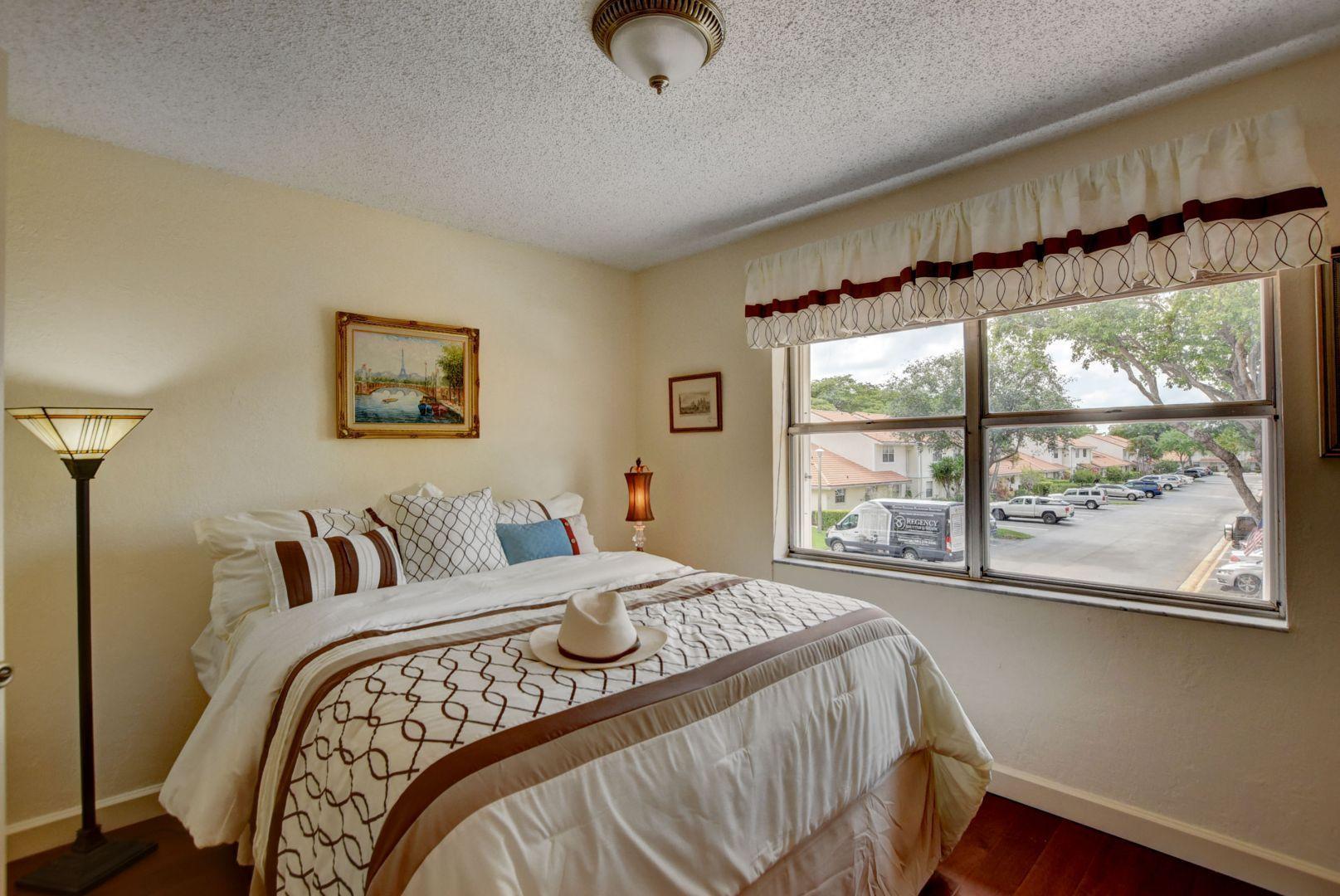 6304 Walk Circle, Unit 10 Boca Raton, FL 33433 - Photo 15 of 26 Guest Bedroom