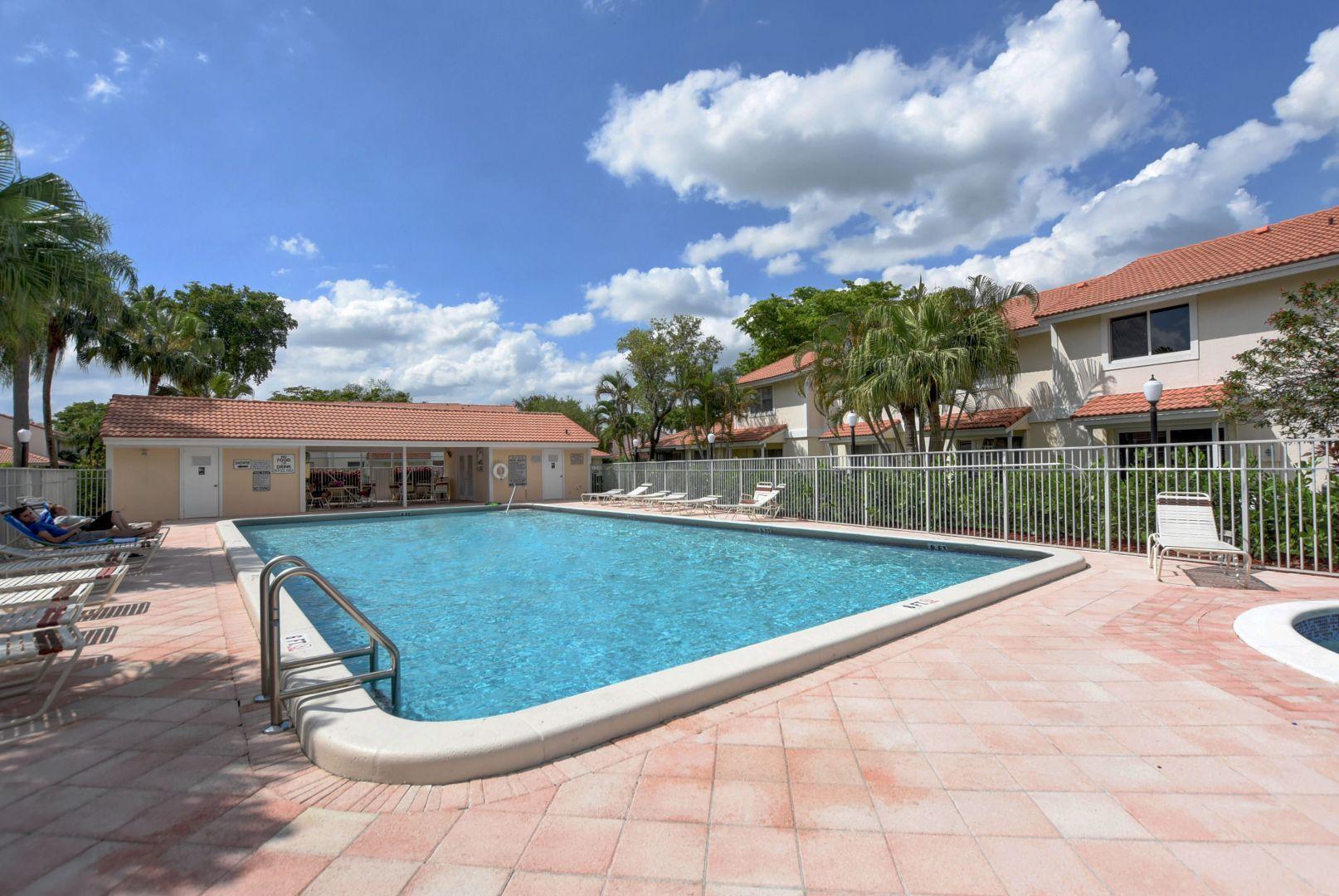 6304 Walk Circle, Unit 10 Boca Raton, FL 33433 - Photo 25 of 26 Heated Pool and sitting Area