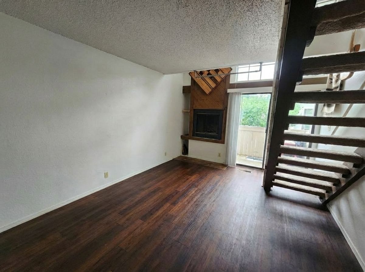 701 West 25th Street, Unit 1 Austin, TX 78705 - Photo 5 of 7 a view of entryway and hall with wooden floor
