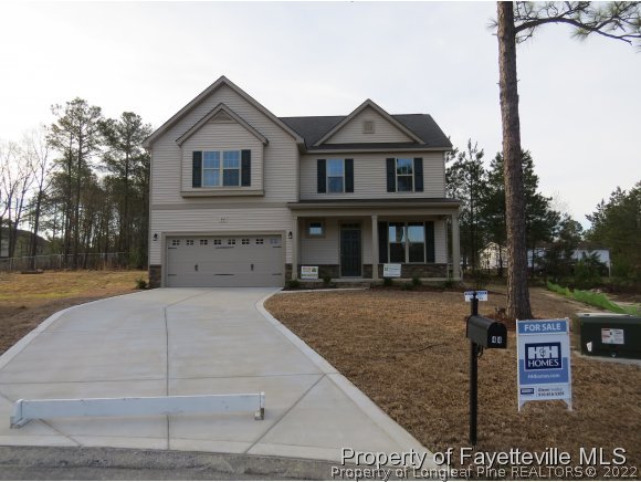 44 Golden Rod (lot 65) Cir Spring Lake Spring Lake, NC 28390 - Photo 1 of 13 a front view of a house with garden