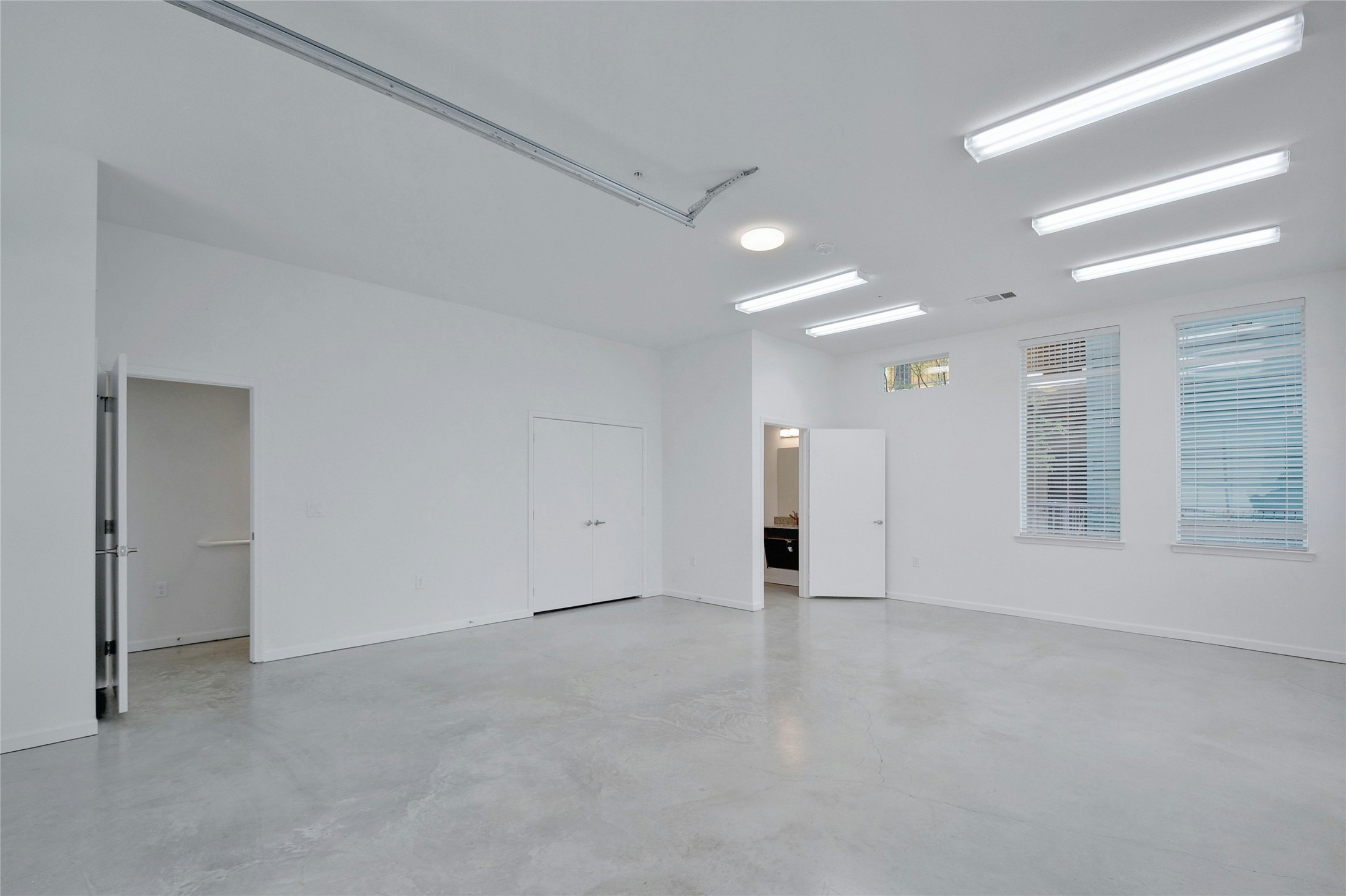 13130 Pond Springs Road, Unit 1105 Austin, TX 78729 - Photo 2 of 22 a view of an empty room with a window