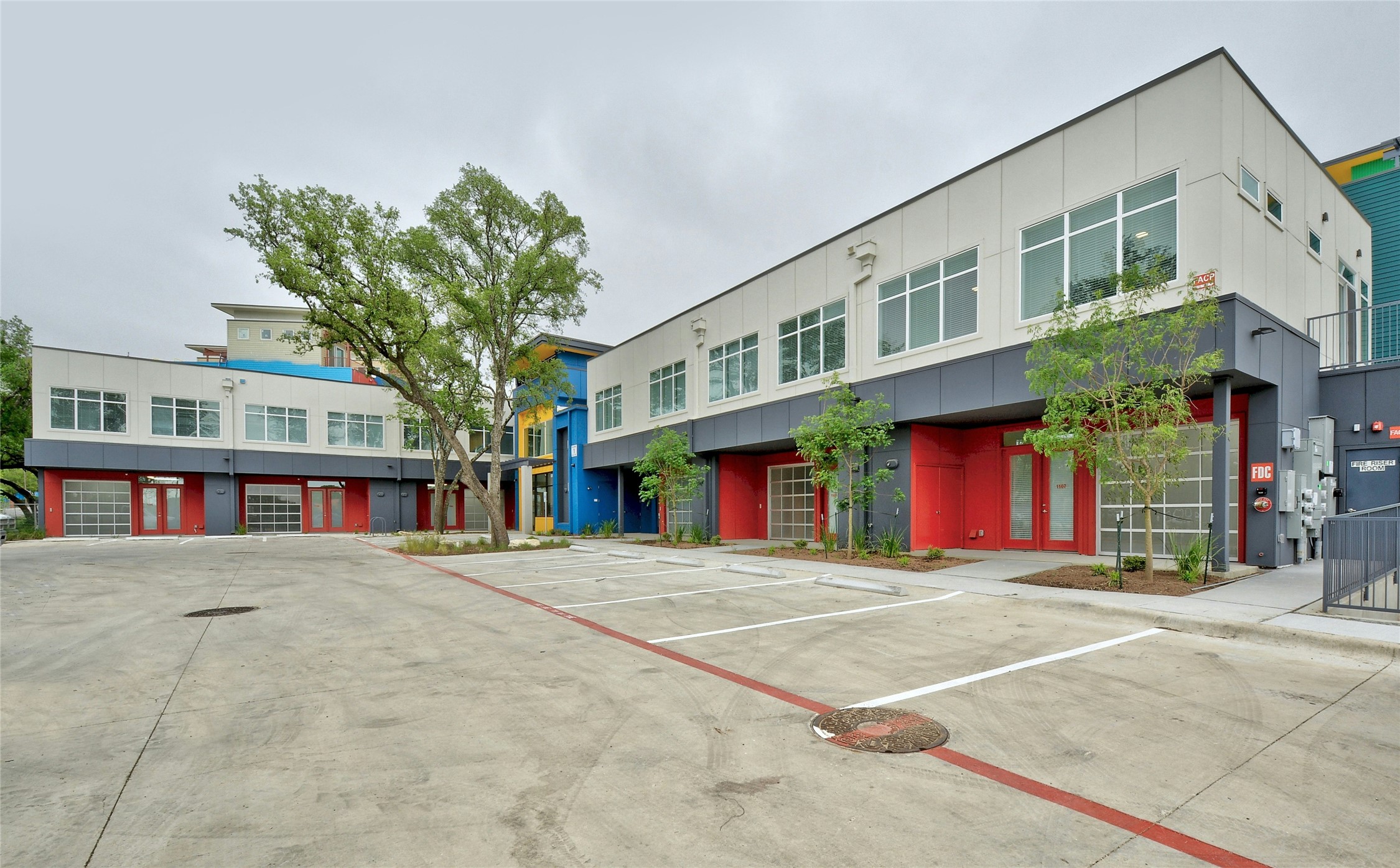 13130 Pond Springs Road, Unit 1105 Austin, TX 78729 - Photo 7 of 22 a front view of a building with traffic signal lights