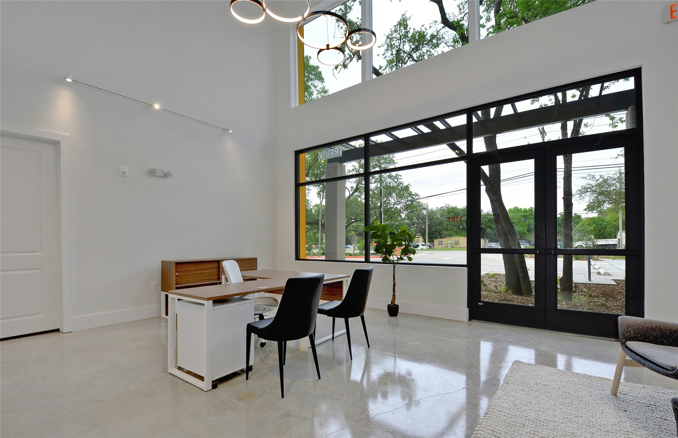 13130 Pond Springs Road, Unit 1105 Austin, TX 78729 - Photo 9 of 22 a living room with furniture and a window