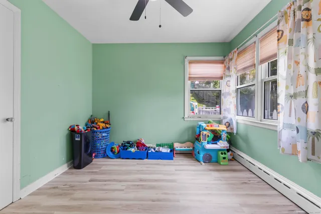 a view of an empty room with stairs