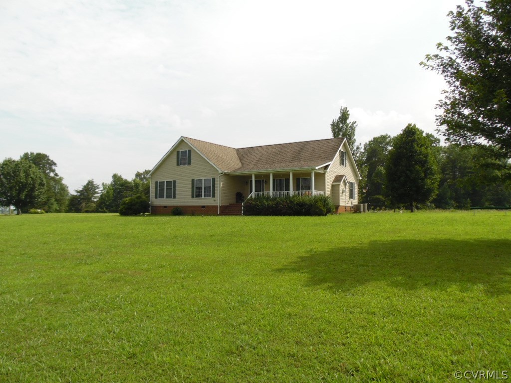 11795 Lunenburg County Road Keysville, VA 23947 - Photo 1 of 28 a front view of a house with garden