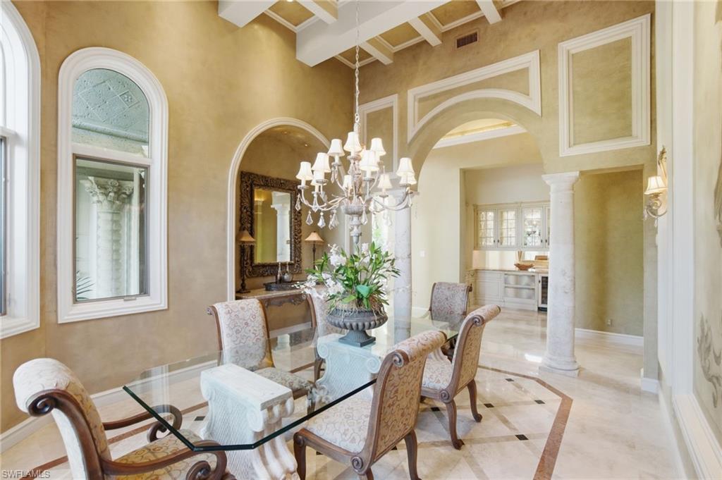 28920 Cavell Terrace Naples, FL 34119 - Photo 16 of 50 a dining room with furniture and window