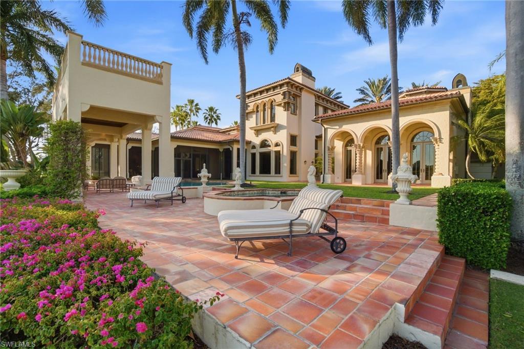 28920 Cavell Terrace Naples, FL 34119 - Photo 38 of 50 a view of a building with a patio