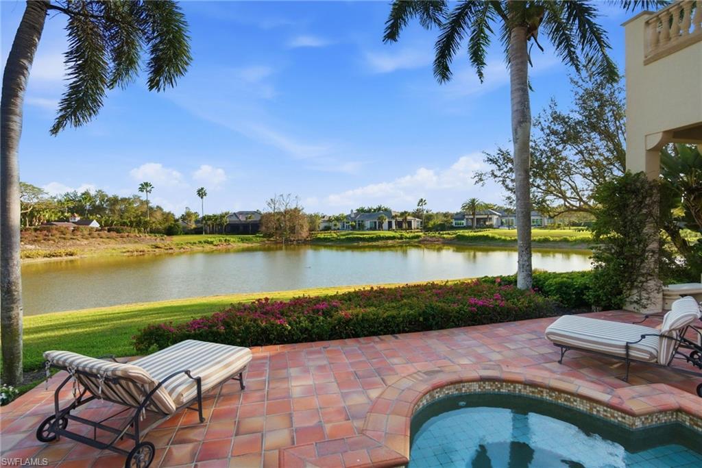 28920 Cavell Terrace Naples, FL 34119 - Photo 40 of 50 a view of swimming pool and lake view