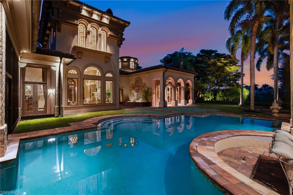 28920 Cavell Terrace Naples, FL 34119 - Photo 4 of 50 a view of a house with swimming pool and porch