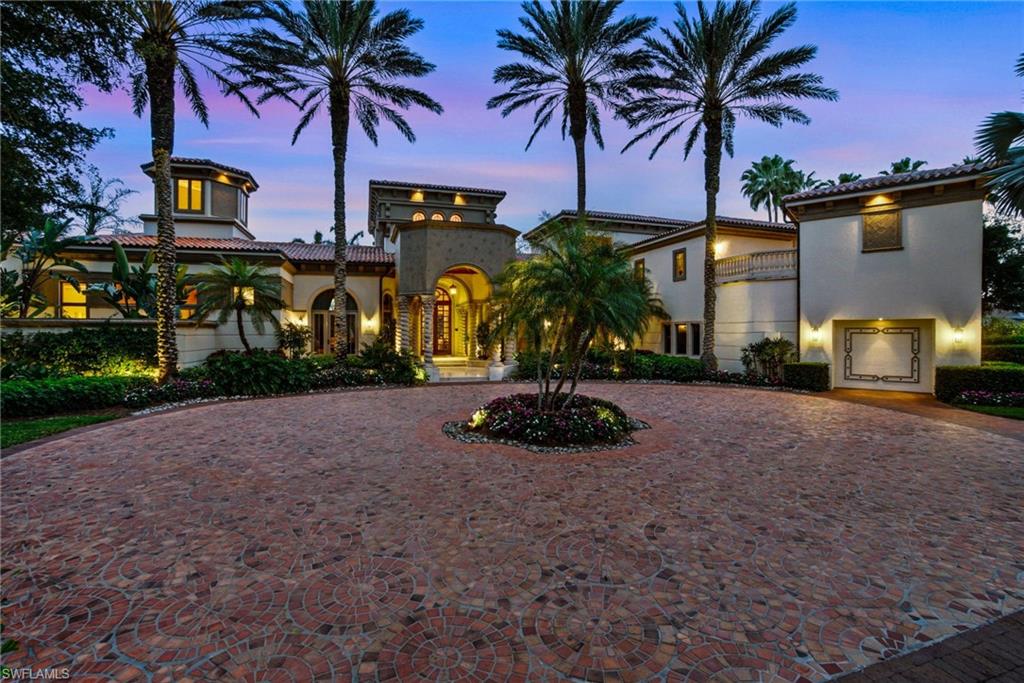 28920 Cavell Terrace Naples, FL 34119 - Photo 44 of 50 a view of a house with a yard and palm trees
