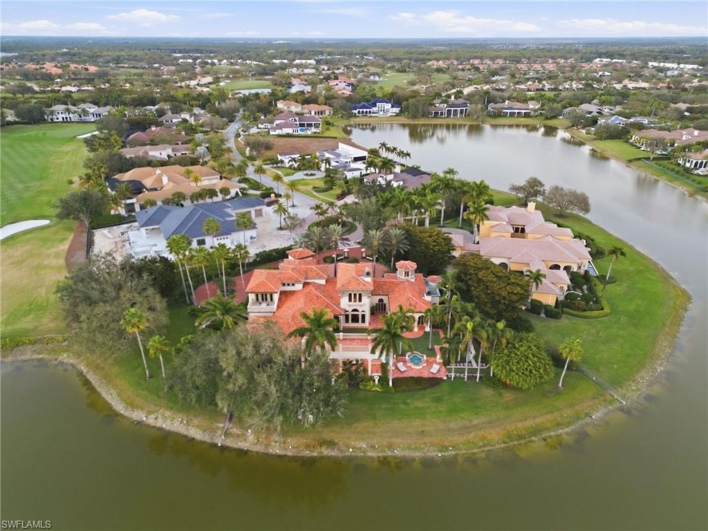 28920 Cavell Terrace Naples, FL 34119 - Photo 45 of 50 an aerial view of residential houses with outdoor space and lake view