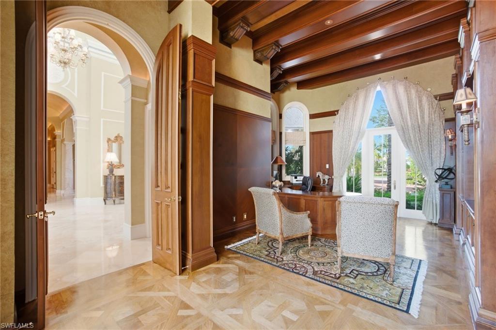 28920 Cavell Terrace Naples, FL 34119 - Photo 9 of 50 a living room with furniture and a large window