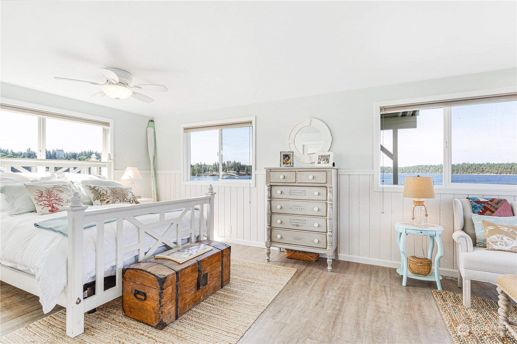 2942 Steamboat Island Road Northwest Olympia, WA 98502 - Photo 25 of 40 a view of a bedroom with furniture and windows