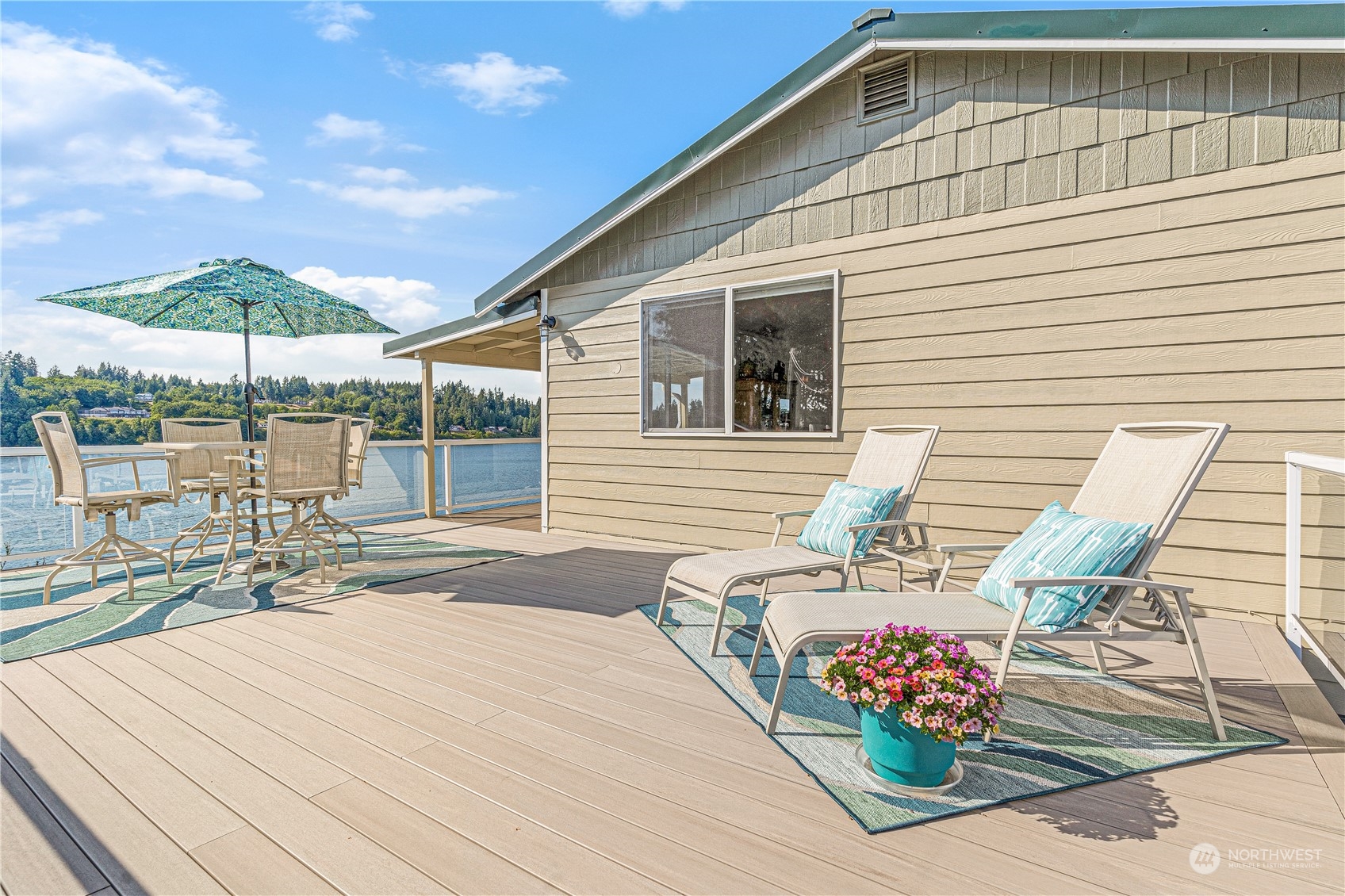 2942 Steamboat Island Road Northwest Olympia, WA 98502 - Photo 36 of 40 a patio with table and chairs