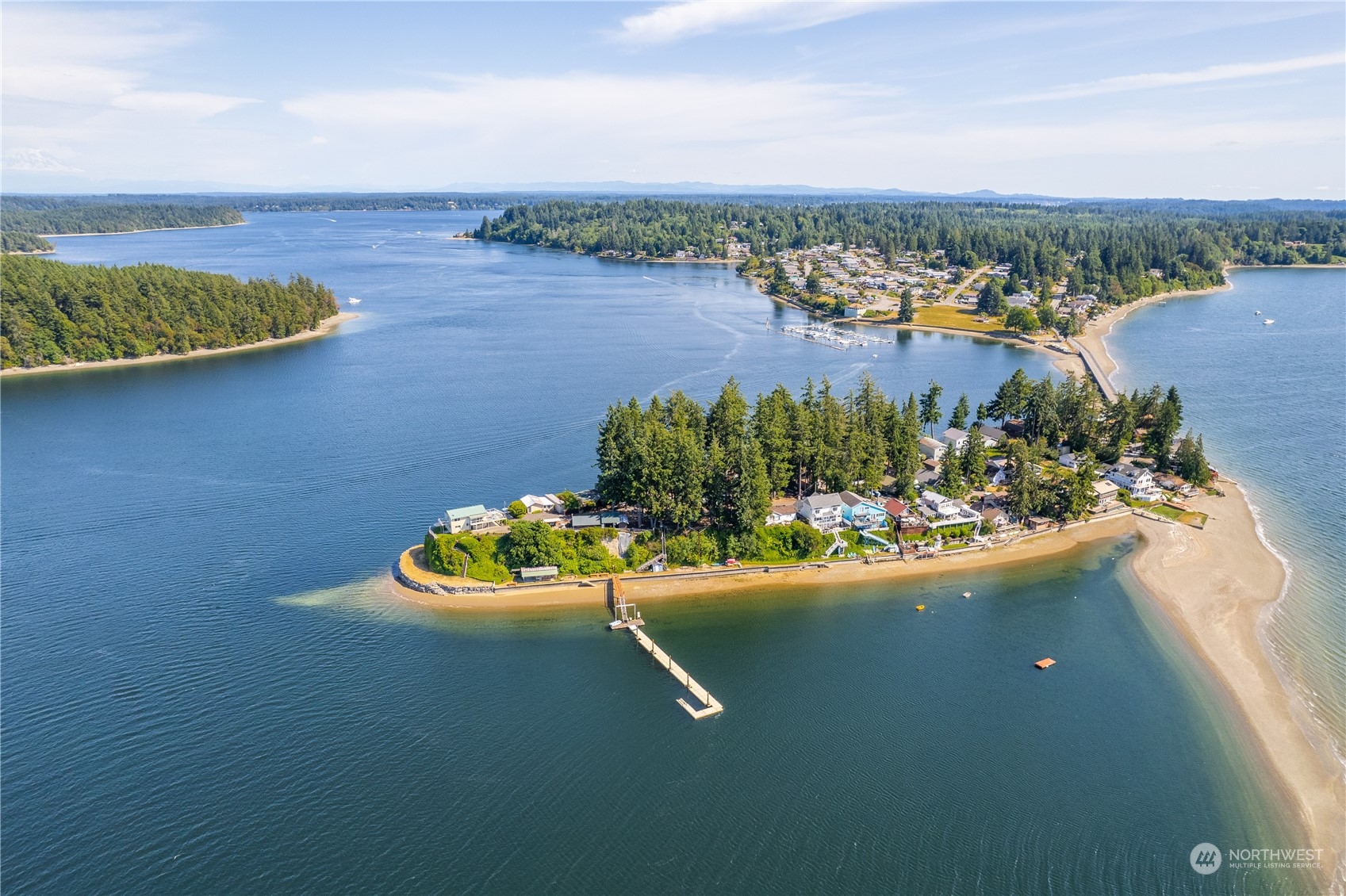 2942 Steamboat Island Road Northwest Olympia, WA 98502 - Photo 7 of 40 an aerial view of a house with a lake view