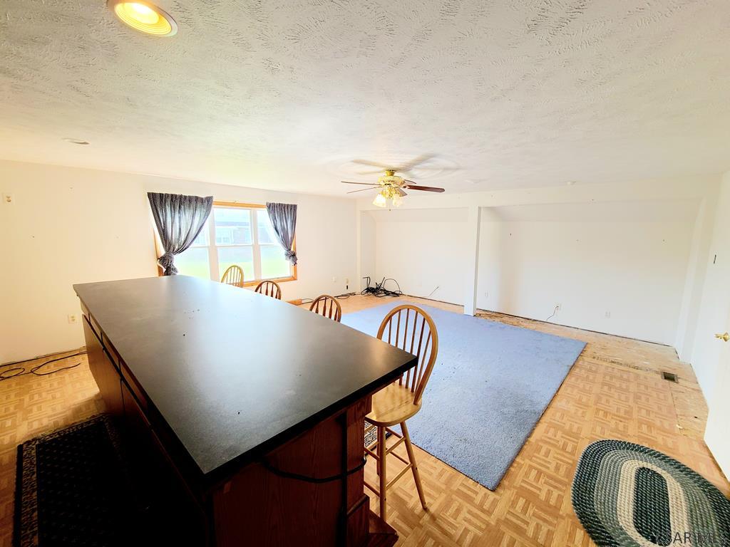3160 Blue Goose Road Nicktown, PA 15762 - Photo 28 of 37 a view of kitchen and dining room with furniture