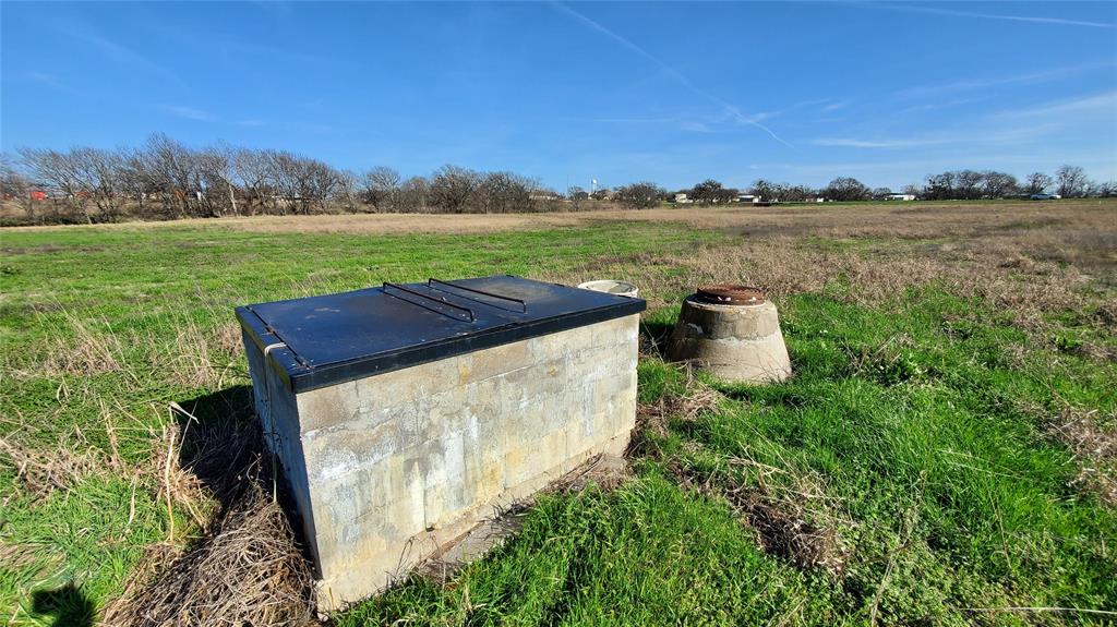 400 Highway 22 Frost, TX 76641 - Photo 20 of 40 a view of a yard with an outdoor seating and a garden
