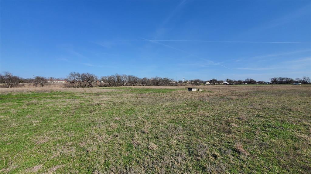 400 Highway 22 Frost, TX 76641 - Photo 24 of 40 a view of a large body of water with lots of trees in the background
