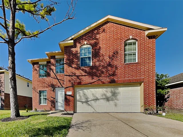 front view of a house with a street