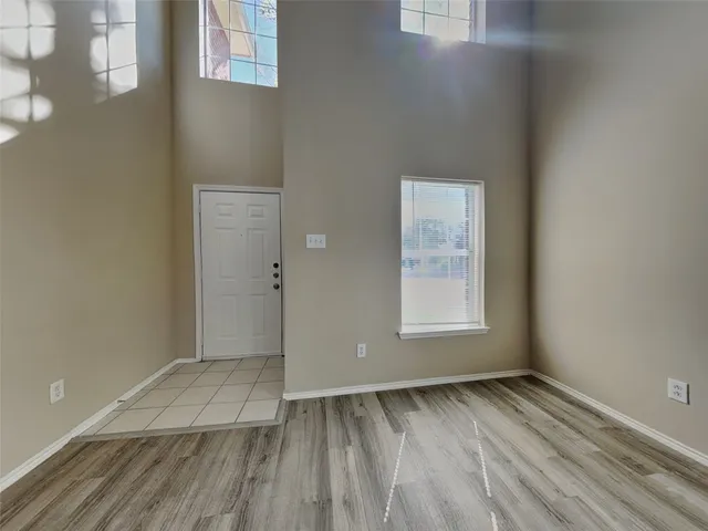 a view of an empty room and window