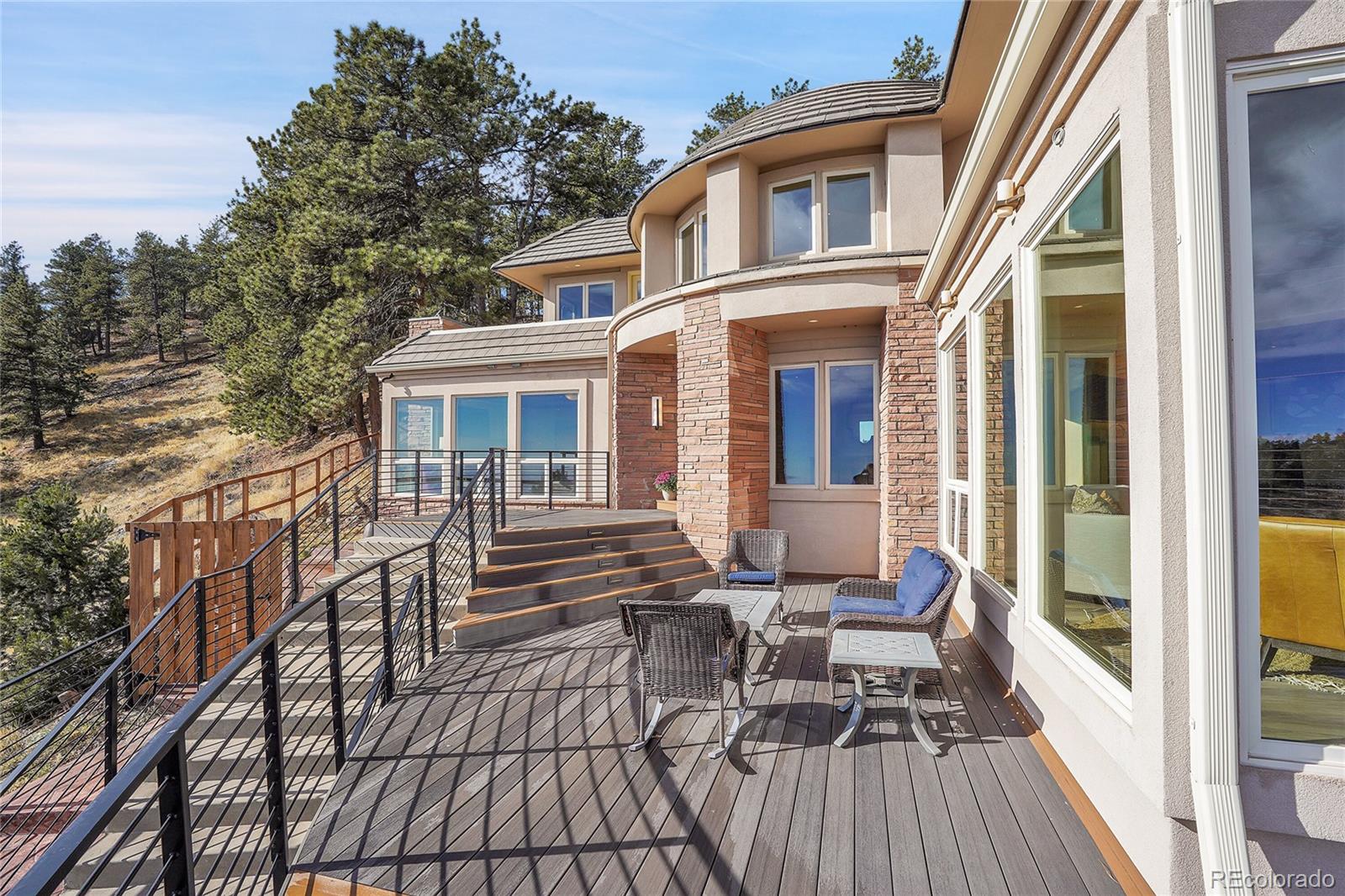 6057 Red Hill Road Boulder, CO 80302 - Photo 29 of 41 a view of a house with sitting area